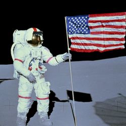 Apollo 14's Alan Shepard planting the U.S. flag on the Moon.