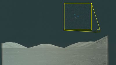 hills on the moon and in a very zoomed in inset three colorful dots.