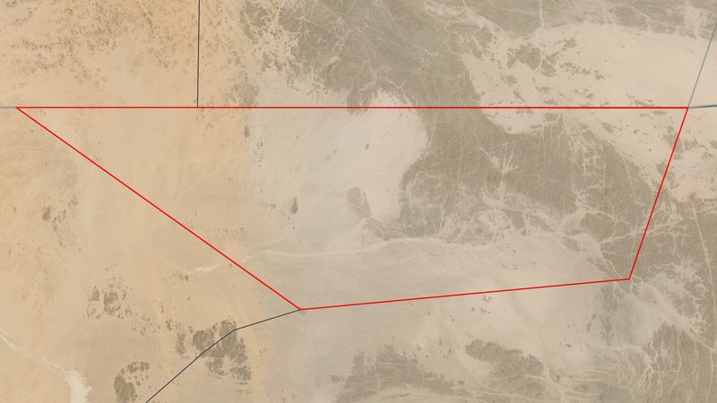 Satellite image of Bir Tawil (highlighted in red), a terra nullius between Egypt and Sudan. This image is composed of two satellite images, one taken on 29 March 2021, and another taken on 5 April 2021.