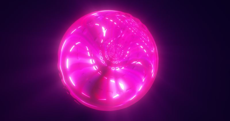 A pink bubble with glowing clusters insideand other bubbles