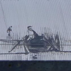 Damage at the Chernobyl New Safe Confinement structure from a drone strike on 14 February 2025. 
