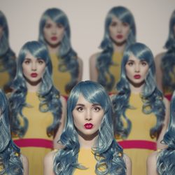 a group of human clones standing together in a crowd