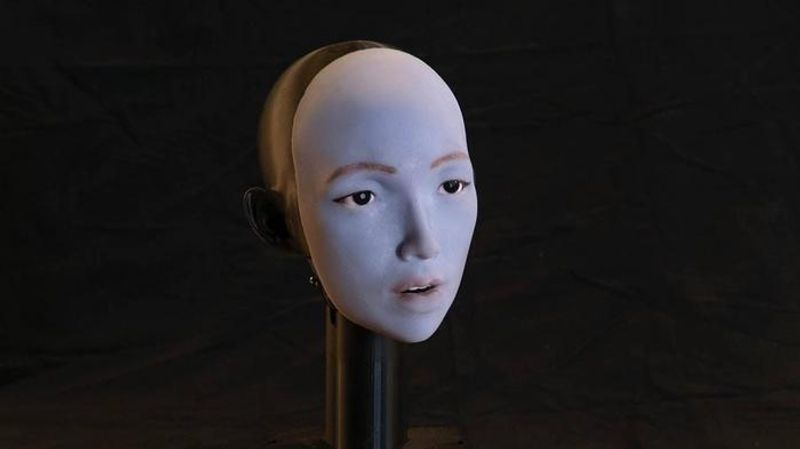 photograph of the face of EMO, a robot that has learnt to lip sync
