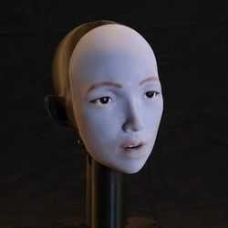 photograph of the face of EMO, a robot that has learnt to lip sync