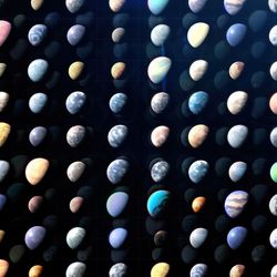 a grid showing artistic impressions of exoplanets