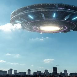 a 3d rendered alien vessel hovering over a city