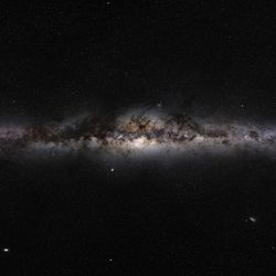The thin band of the milky way and the dark gas clouds clearly visible in this great picture of the galaxy