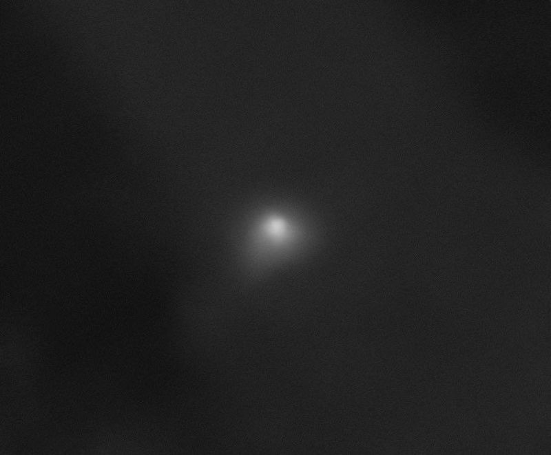 a fuzzy image showing the bright coma and the little tail of the comet