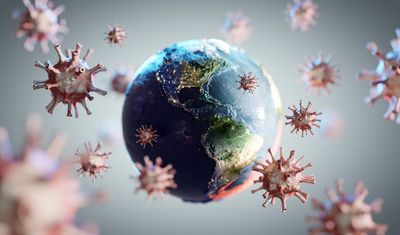 concept art of pandemic; virus particles surrounding a globe