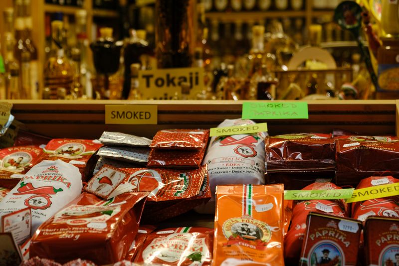 A variety of different paprika powders being sold at a market in Hungary.