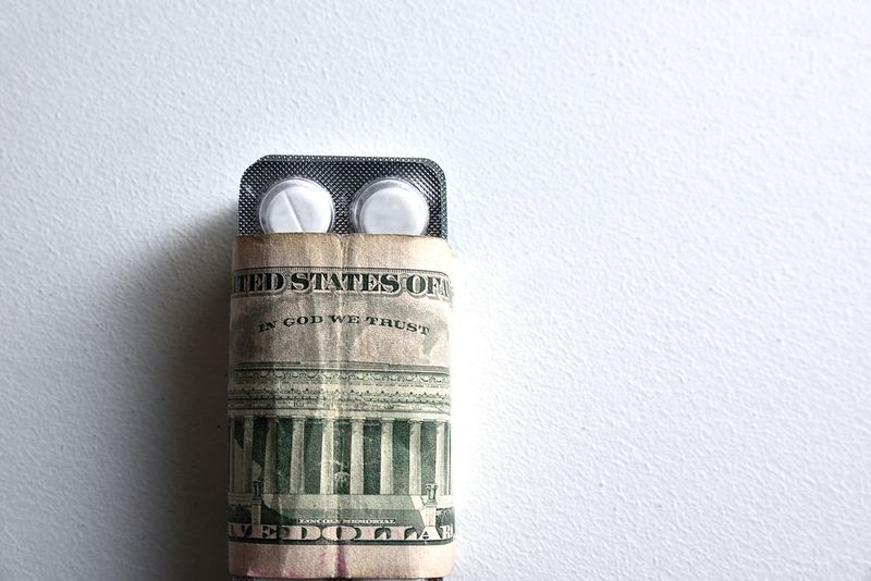 Prescritpion pills wrapped in $20 bills