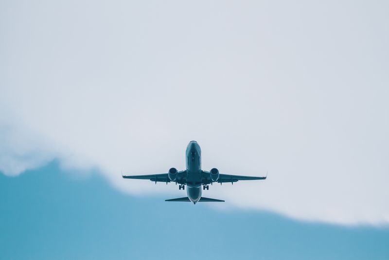 Plane taking off on a long journey across the Atlantic ocean. 