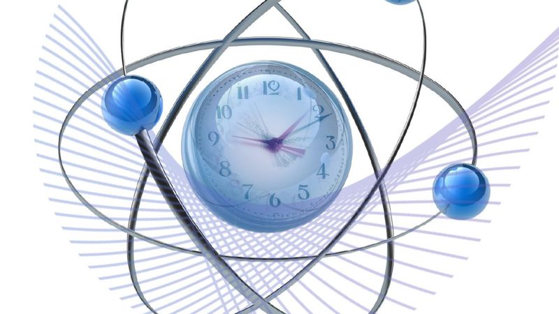 a clock sits at the center of orbital representation of an atom