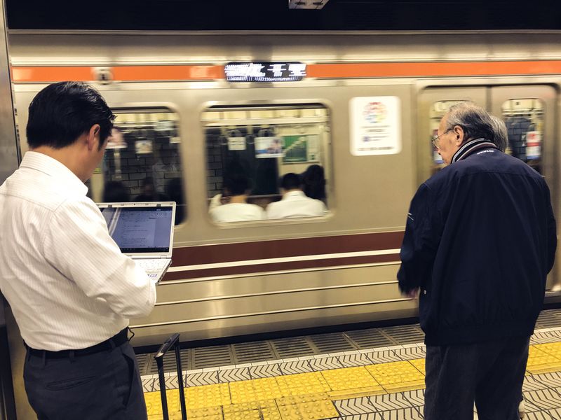 Japan's salaryman buisiness on the Tokyo subway