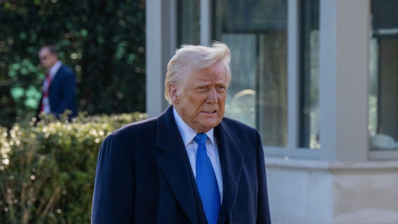Trump is seen walking outside