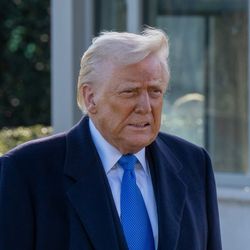 Trump is seen walking outside