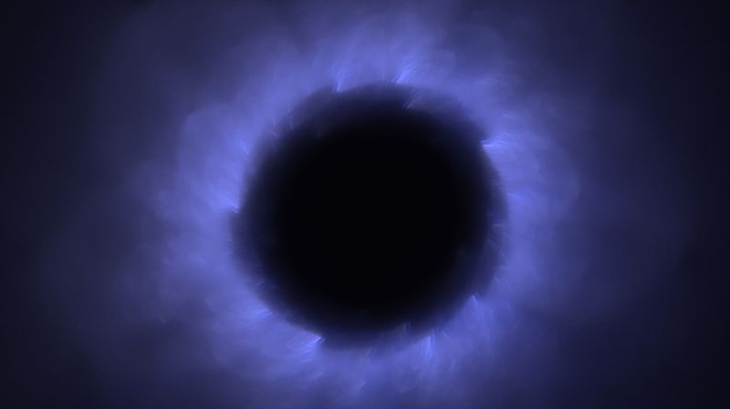 A huge spherical dark void with blue light around it 