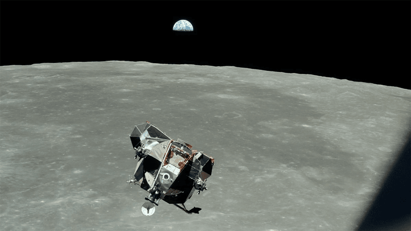 The Apollo 11 Lunar Module ascent stage above the Moon.