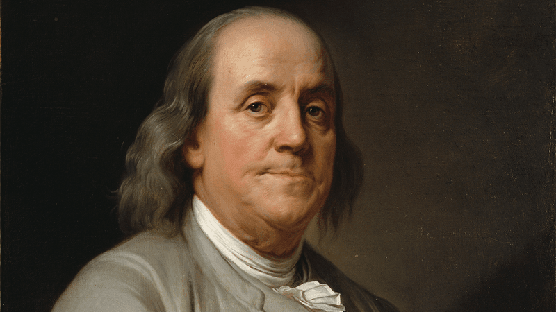 A painted portrait of Benjamin Franklin.