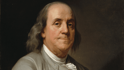 A painted portrait of Benjamin Franklin.