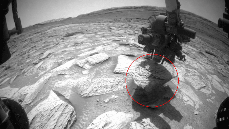 The Curiosity rover's drill bit, stuck in a piece of Martian rock.