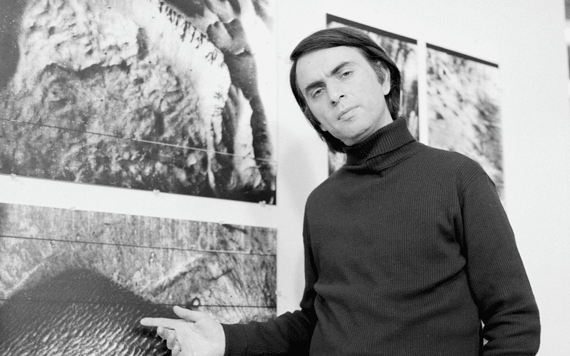 Carl Sagan, complete with his iconic polo neck jumper.