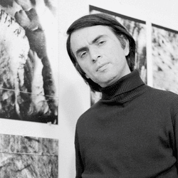 Carl Sagan, complete with his iconic polo neck jumper.