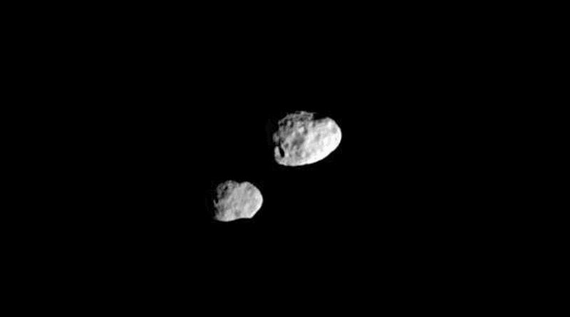 Janus (right) and Epimetheus look like they're almost touching in this photo, in keeping with their almost identical orbits, but this image was taken when they were thousands of kilometers apart.