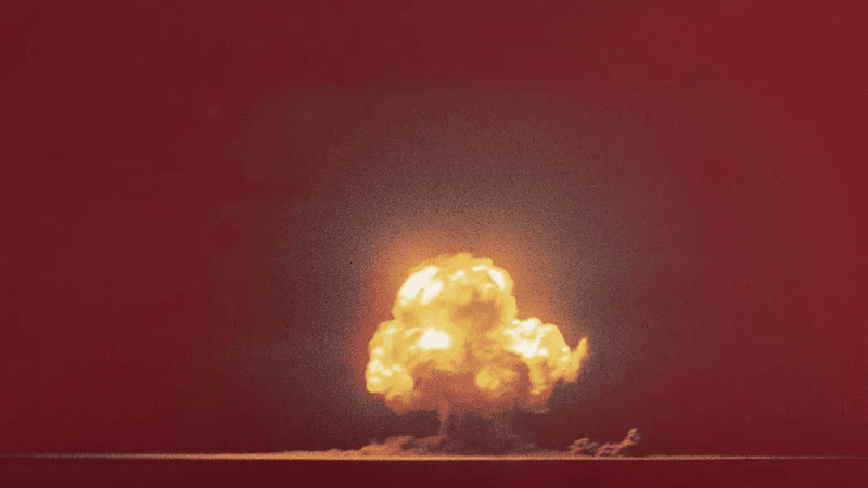 the beginning of the mushroom cloud from the trinity explosion