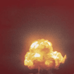 the beginning of the mushroom cloud from the trinity explosion