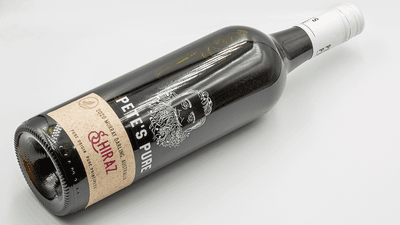 A wine bottle, with an indent, or "punt", at the bottom.